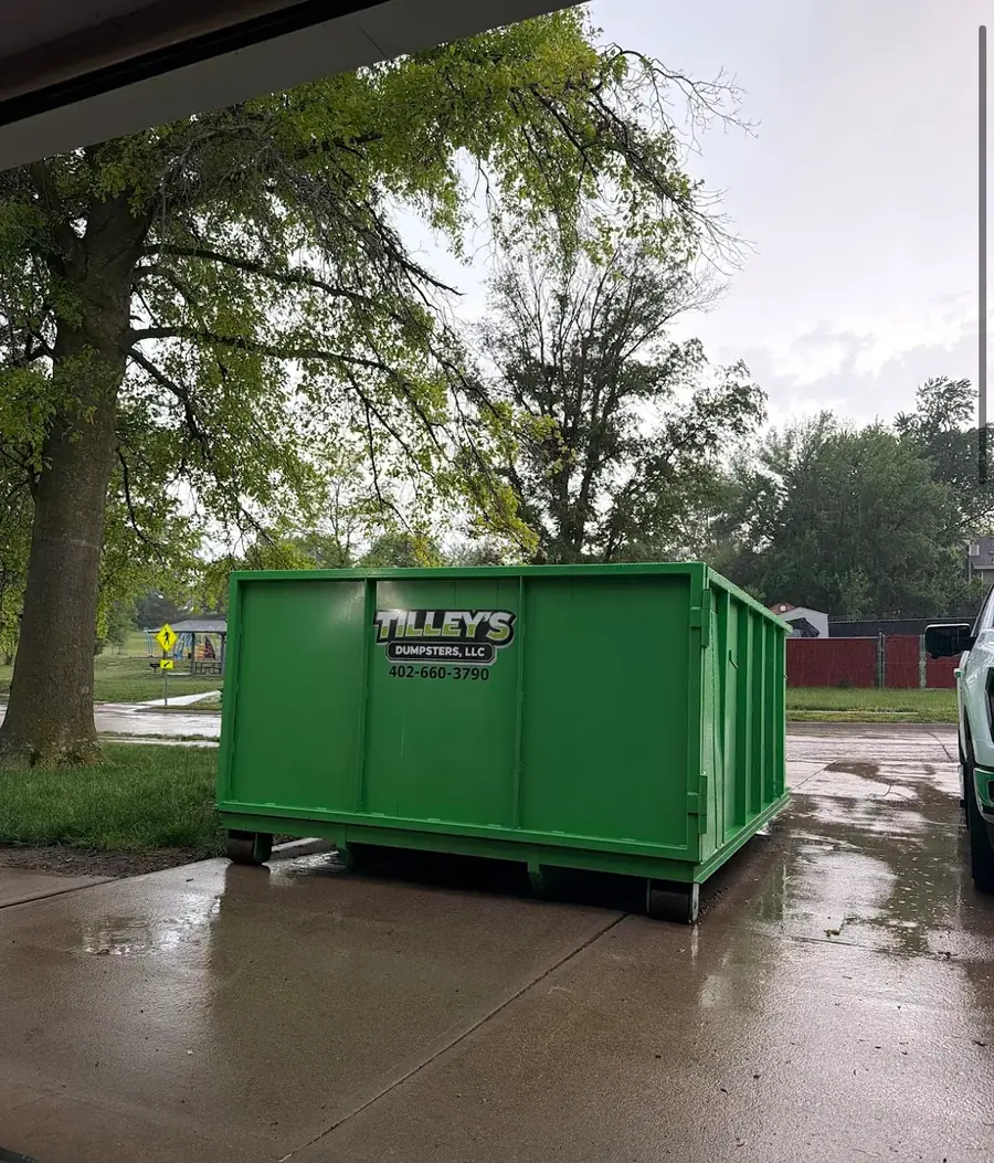 Tilley's green roll-off dumpster &mdash; Neighborhood