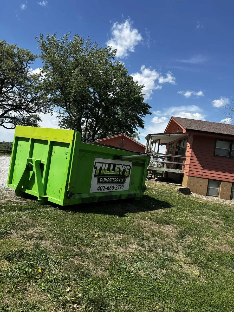 Tilley's green roll-off dumpster &mdash; Rural property